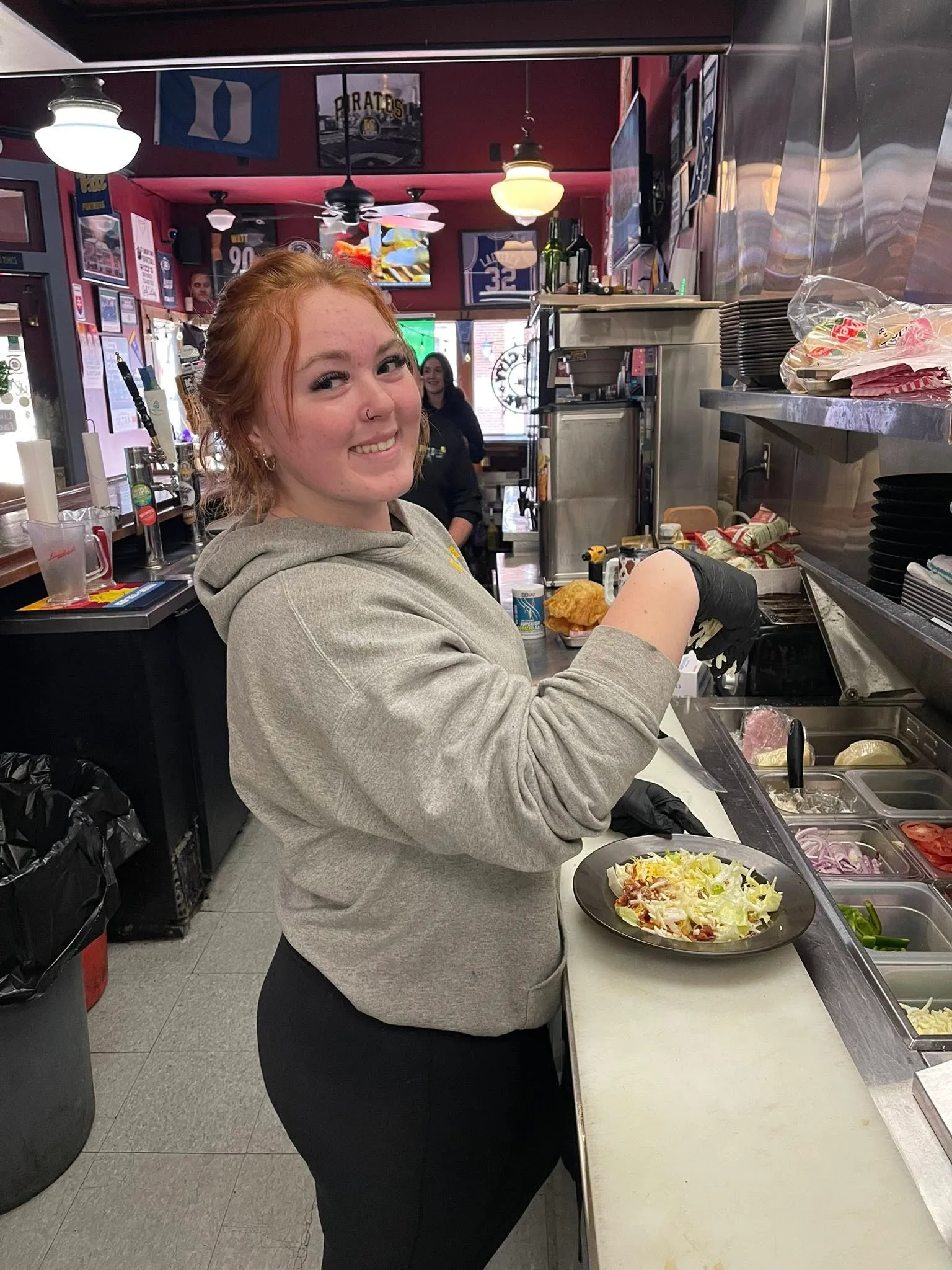 Staff member prepping on the line